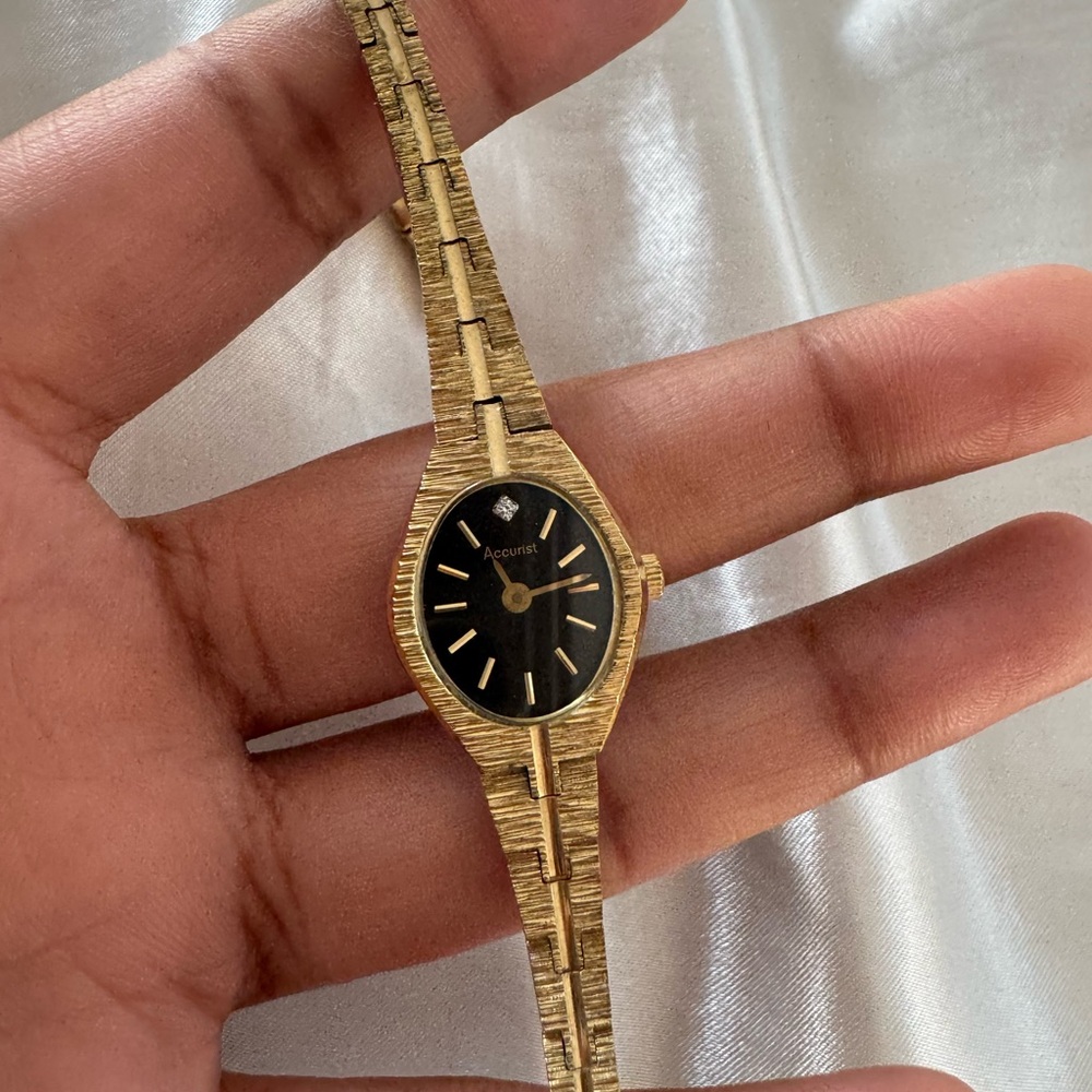 Accurist Gold and Black Women's Watch